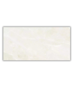 Sobre o produto O revestimento Incefra 36940 da possui um acabamento brilhante, proporcionando uma superfície reflexiva que realça a elegância do ambiente. Este revestimento é resistente a manchas d'água, garantindo durabilidade e facilidade de manutenção, sendo ideal para áreas úmidas ou de alta utilização. A estampa imita mármore com grande realismo, oferecendo um toque sofisticado e luxuoso ao espaço. Com uma variação de 6 faces, o padrão é diversificado, conferindo uma aparência natural e dinâmica, semelhante ao mármore verdadeiro. Medindo 35 centímetros por 70 centímetros, este revestimento retangular é versátil e adequado para diversas aplicações, tanto em áreas residenciais quanto comerciais. O tamanho das peças facilita a criação de superfícies contínuas, minimizando o número de juntas visíveis e resultando em um visual mais uniforme e elegante. Além disso, a borda retificada garante um acabamento preciso e uniforme, permitindo a instalação com juntas mínimas. Esse tipo de borda é perfeito para quem busca um visual moderno e refinado, assegurando um acabamento limpo e sofisticado nas superfícies revestidas. [divider] Sobre nós Bem-vindo ao Atacadão dos Pisos, o destino final para todas as suas necessidades de materiais de construção! Com nossa ampla gama de produtos, ajudamos você a construir a casa dos seus sonhos. Nossa loja tem tudo que você precisa, desde pisos até revestimentos e muito mais. Além disso, com mais de 300 modelos de pisos e revestimentos à sua escolha, você encontra exatamente o que procura para dar o acabamento perfeito à sua casa. Entendemos que o tempo é fundamental quando se trata de projetos de construção. Por isso, oferecemos entrega em até 48 horas dentro do estado do Rio de Janeiro. Dessa forma, você não precisa se preocupar com atrasos ou tempos de espera prolongados. Nós temos você coberto! No Atacadão dos Pisos, também proporcionamos opções de pagamento flexíveis para facilitar sua compra. Você pode pagar em até 10 vezes sem juros, permitindo que você se concentre na construção da sua casa sem se preocupar com o encargo financeiro. Queremos fazer parte da sua felicidade, ajudando na construção da casa dos sonhos. Reconhecemos que uma casa confortável e acolhedora é essencial para o bem-estar geral. Por isso, queremos ajudá-lo a alcançar essa felicidade, fornecendo-lhe os melhores materiais de construção. Convidamo-lo a visitar a nossa loja física, onde o nosso pessoal simpático e experiente terá todo o prazer em ajudá-lo na sua compra. Estamos localizados em Av. Presidente Lincoln, 411 ou 410 | Jardim Meriti - São João de Meriti, RJ, e mal podemos esperar para recebê-lo! Venha e veja você mesmo porque o Atacadão dos Pisos é a melhor escolha para todas as suas necessidades, proporcionando uma casa recheada de felicidade para você e sua família. Veja Mais Como O Revestimento Incefra 36940 Clicando Aqui!